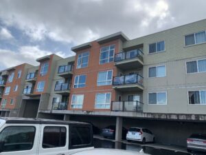 A wide shot of a large commercial residential complex with multiple buildings, perfect for comprehensive window cleaning services by Spotfree Window.